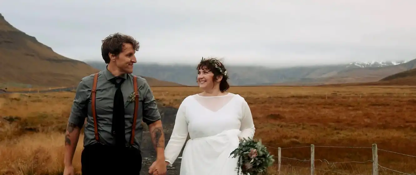Couple hold hands and elope in Iceland with their Iceland Videographer