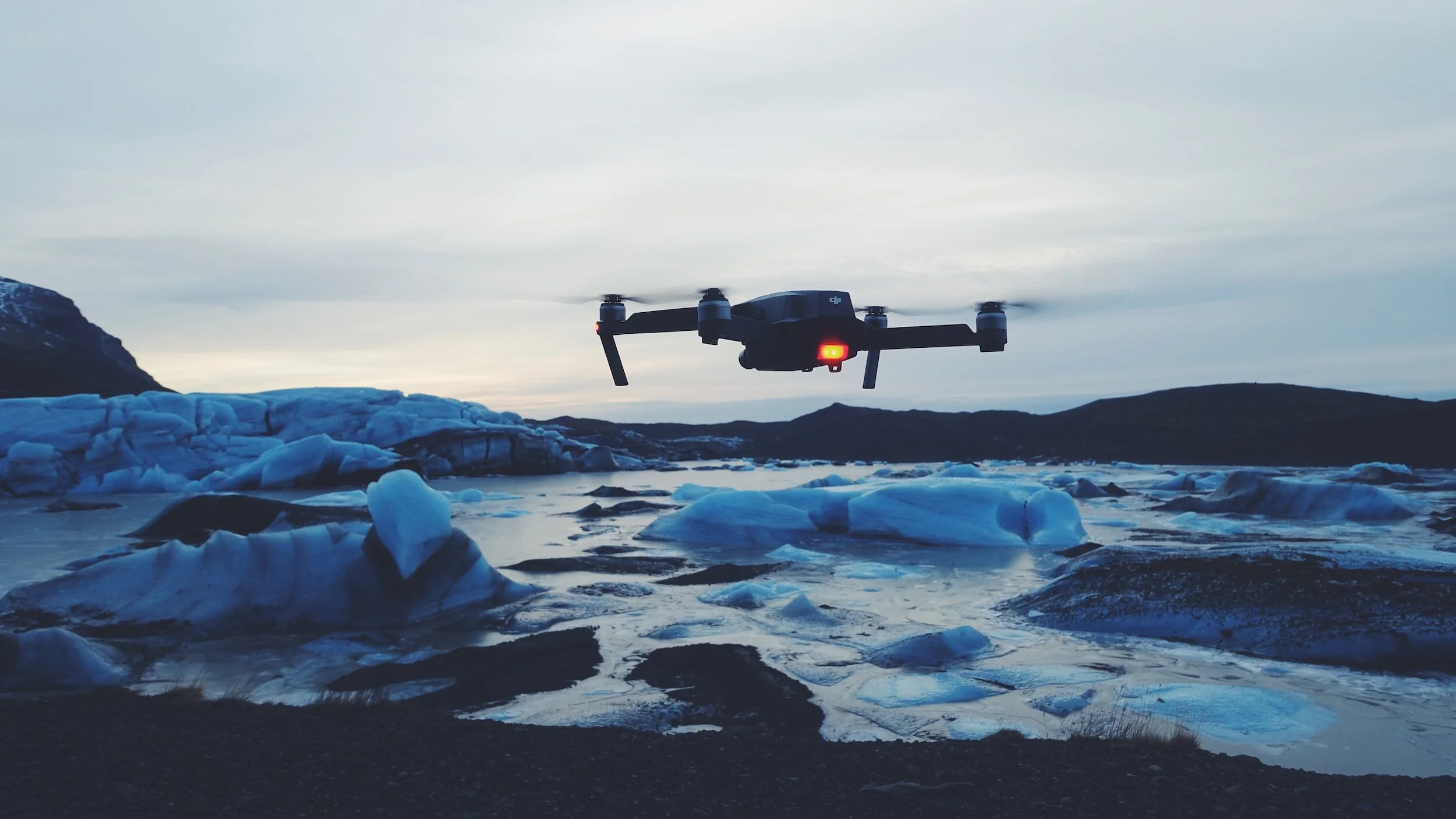 Drone pilot flying over Iceland